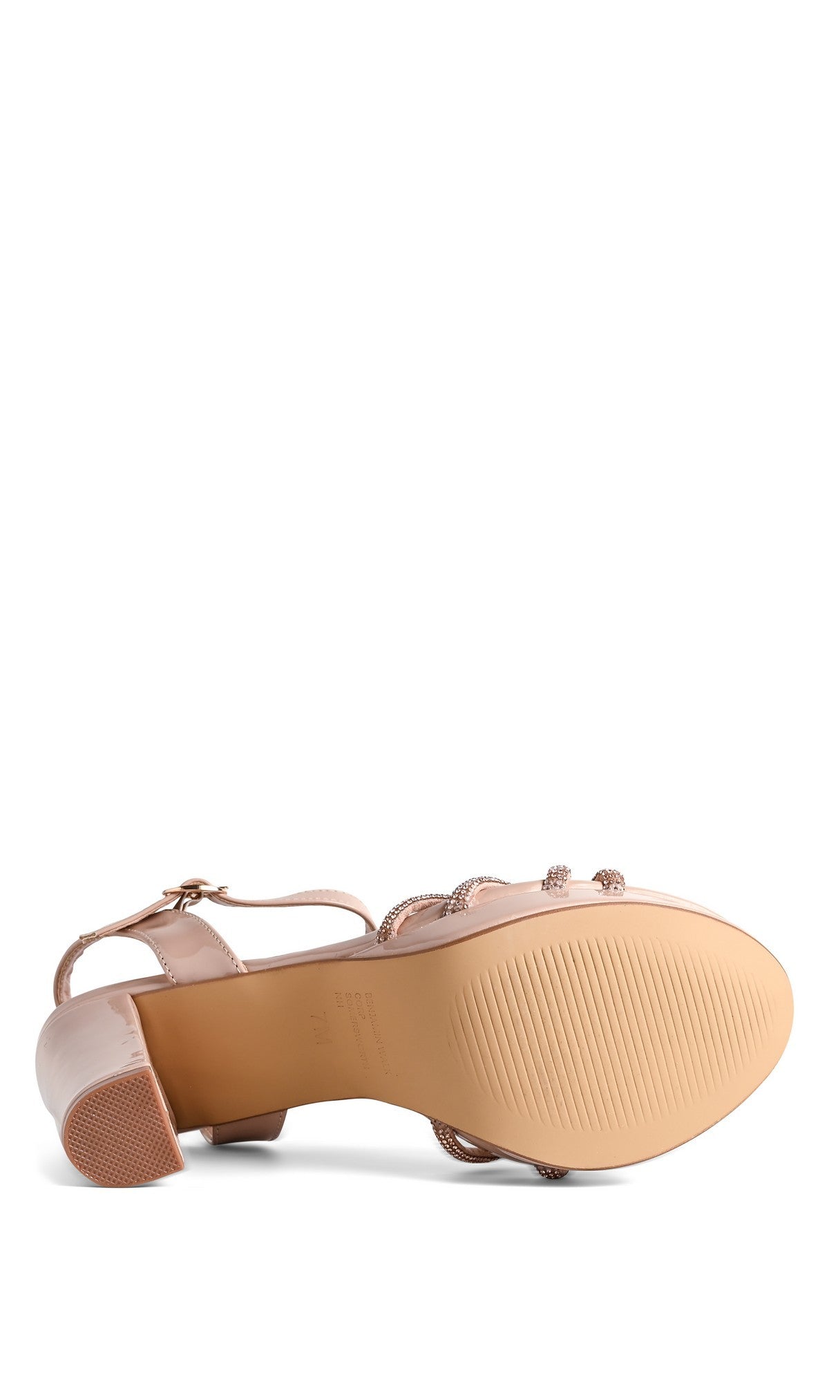 The Tyler Nude Prom Shoes (Touch Ups 4758) feature strappy blush uppers, a low block heel, a textured sole, and an ankle strap—ideal chic nude heels for prom.